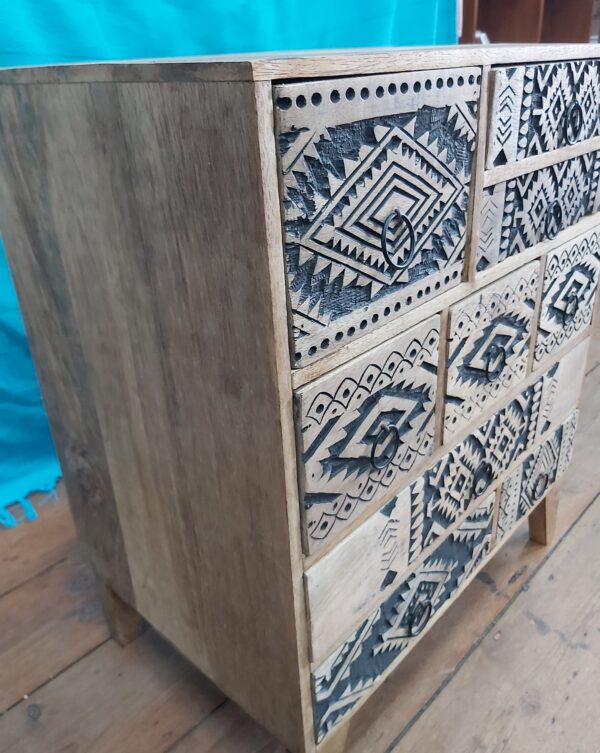 Indian Nine Drawer Mango Wood Bedside Cabinet with a black wash finish to the front Carving